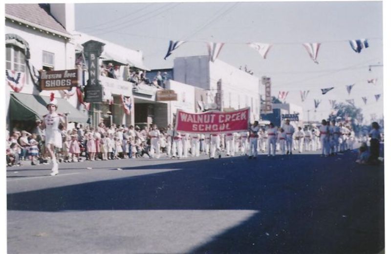 Walnut Creek School Band - Walnut Festival Parade on Main Street. Johanna Rose, Majorette